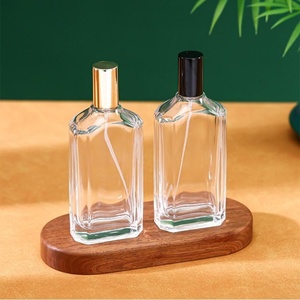 Vente directe d'usine, design unique, flacon de parfum en verre transparent carré plat de 100 ml avec vaporisateur fin et couvercle - Product Image 4