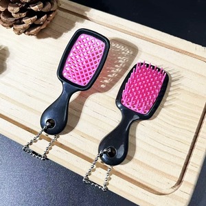 Nuovo Pettine Massaggiante a Nido d'Ape in ABS, Impermeabile UV, Stile Creativo Europeo e Americano, Ciondolo Portachiavi - Product Image 5