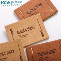 Étiquettes personnalisées en cuir PU denim avec logo en creux et à la main pour jeans
