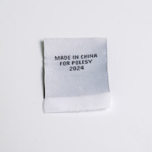 Etiquette tissée personnalisée à coudre sur support, parfaite pour vestes et sacs en cuir - Product Image 1