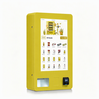 Distributeur automatique mural 32 pouces avec fonction SDK, fonctionnement automatique par pièces de monnaie, avec mini-réfrigérateur intégré pour la vente de produits.