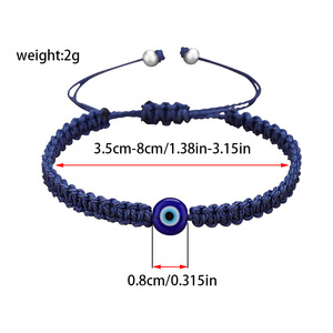 Pulsera de cuerda trenzada roja y blanca hecha a mano Resoul con amuleto de mariquita y flor margarita, joyería de protección y buena suerte para mujer - Product Image 5
