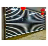 Porte commerciale de conception moderne à volet roulant en aluminium transparent polycarbonate verre acier automatique pour les centres commerciaux intérieurs et extérieurs