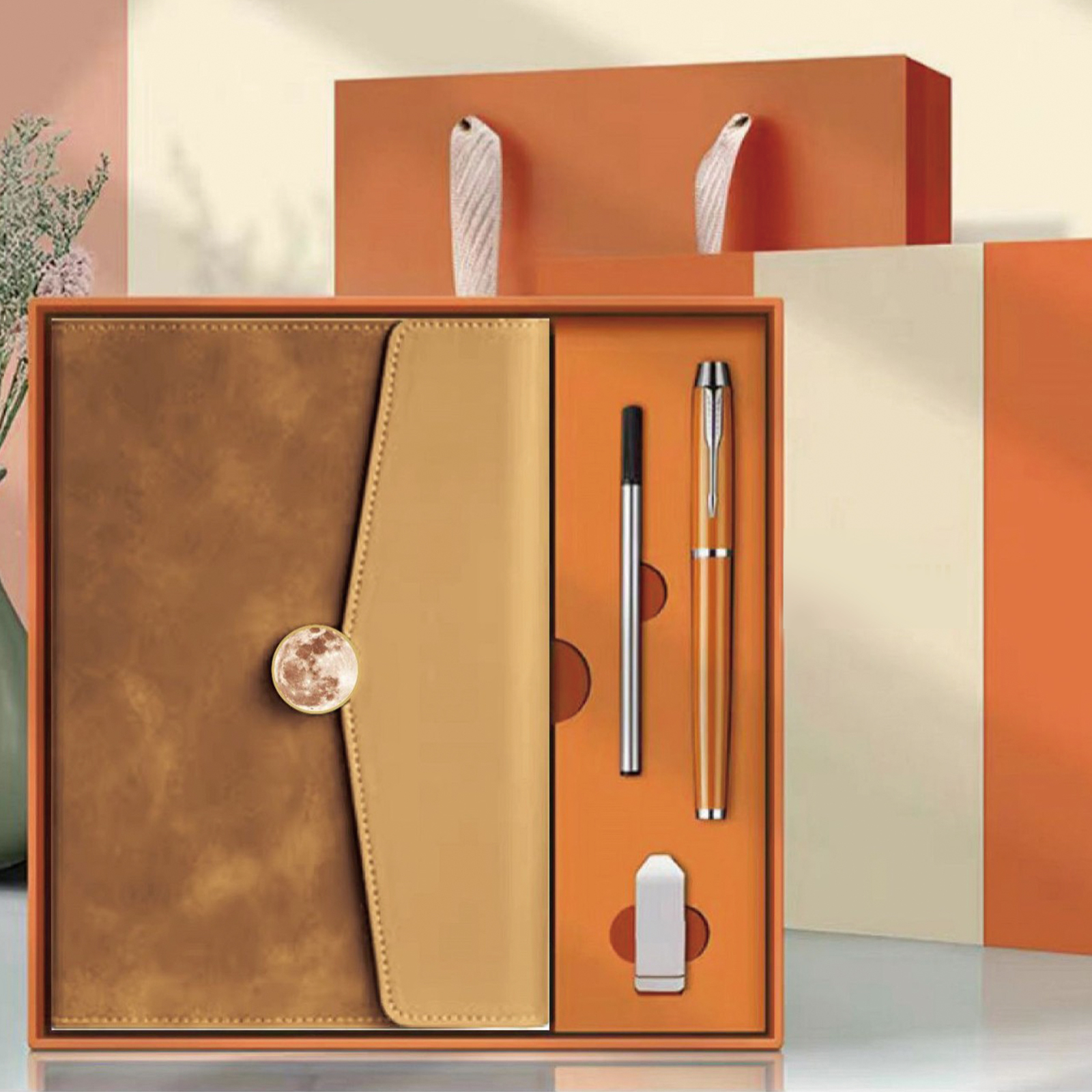 Notebook + Pen + Pen refill + USB drive
