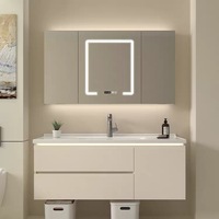 Meuble de salle de bain minimaliste style crème avec vasque en céramique intégrée, ensemble vasque et meuble sous-vasque
