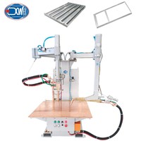 Machine de soudage par points à bras articulé, à souduer d'un seul côté, avec deux pistolets de soudage verticaux et horizontaux