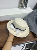 Chapeaux Fedora élégants en feutre de laine australienne 100% pour femmes, modèle 2027, avec nœud en satin, style boater à dessus plat, pour l'hiver.