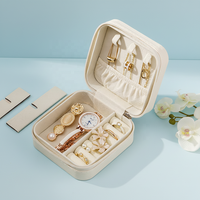 Boîte à bijoux carrée portable en cuir 10x10x5cm, style européen-américain, avec fermeture éclair, pour rangement d'accessoires de voyage et de boucles d'oreilles