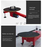 Machine d'emballage à film étirable à bobine unique, compacte et mobile, avec commande au pied, pour l'emballage uniforme des films et la protection des cartons et des marchandises