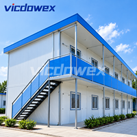 VICDOWEX Maison préfabriquée de luxe en forme de T personnalisée avec panneaux en acier et sandwich pour bureau de chantier et logement à long terme
