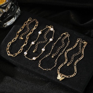ZYO Nouveau Ensemble de Bijoux Bohème Étanche 4 Pièces pour Femme : Chaîne de Cheville Papillon à Chaîne Dorée, Bracelets à Maillons Cubains, Chaîne de Pied de Plage - Product Image 4