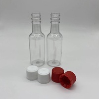 Bouteilles miniatures de 50 ml (1,7 fl oz) en PET pour spiritueux et boissons énergisantes, avec bouchon à vis inviolable, sérigraphie couleur personnalisée, qualité alimentaire