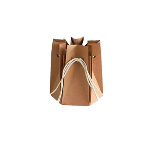 Custom kraft paper shopping bags with handles, eco-friendly and durable, suitable for retail and packaging. - Product Image 3