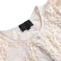 Chemisier court léger et transparent à manches longues pour femme, col rond, ajusté, brodé de dentelle florale, style vintage, simple boutonnage, épaules rembourrées