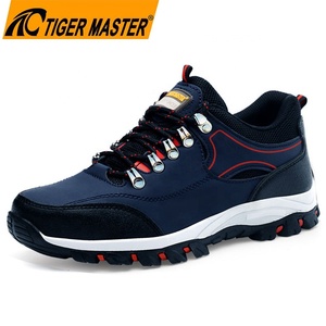 Chaussures de sécurité de travail pour hommes Tiger Master Blue en cuir microfibre antidérapant avec semelle en caoutchouc, embout en acier, anti-perforation pour la construction et les mines - Product Image 1