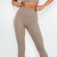 Ensemble de yoga asymétrique personnalisé grande taille pour femme, pantalon uni à rayures contrastées sur le côté, leggings sans couture avant, poche discrète, pour la gym et l'entraînement