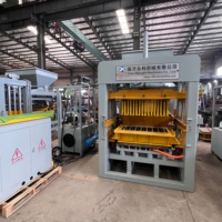 Machine à mouler des blocs de béton QT4-15 pour la production de briques creuses et de blocs pleins