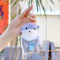 Porte-clés en peluche 3D mignon et doux, en forme de castor ou de loutre marine tenant une poisson, breloque de sac, poupée pour machine à griffes