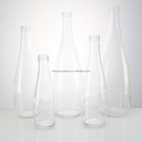 Vente chaude 330ml 11oz clair rond silex verre bouteille d'eau pétillante boisson bouteille en verre d'eau minérale avec bouchon à vis en aluminium