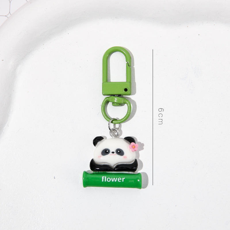 Llavero de la serie Panda Adorable con flor de bambú.