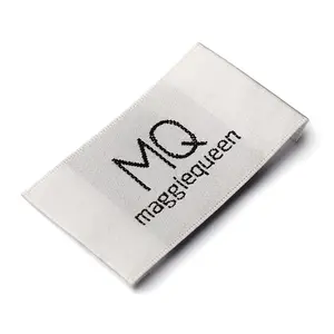 Bahan kain dijahit pada label logo tenunan yang disesuaikan untuk garmen pakaian
