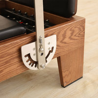 Reformer de Pilates en bois massif durable, personnalisable en couleurs et logos, avec tour et demi-trapèze, pour débutants et professionnels