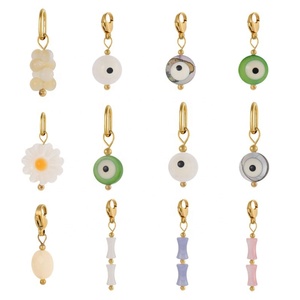 เดอะ เชลล์ เอ็ดดิท |   เปลือกหอยธรรมชาติติดตั้งบนสแตนเลสสตีลเคลือบทอง 18K PVD กันน้ำ |   กันน้ำ ป้องกันอาการแพ้ และทนทาน - Product Image 1