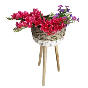 <span class=keywords><strong>Maceta</strong></span> <span class=keywords><strong>tejida</strong></span> a mano de ratán PE con pata de madera independiente, cesta de flores al aire libre, venta al por mayor - Product Image 1