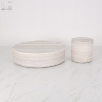 Table basse ronde en fibre de verre de forme travertin, style Wabi Sabi minimaliste moderne et luxueux, pour le salon