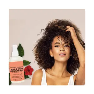 Les cheveux bouclés épais OEM créent des boucles brillantes, contrôle de l'humidité du karité, de la noix de coco et de l'hibiscus, tenue et brillance du brouillard d'humidité