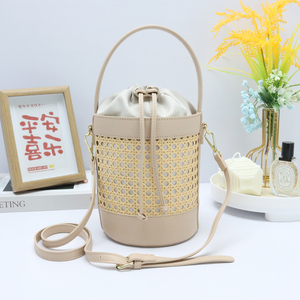 Trendy Classic Design Hollow Out Bamboo Women's Woven Rattan Beach Bucket <strong>Bag</strong> Womens Crossbody <strong>Bag</strong> With Genuine Leather Handle - Product Image 1