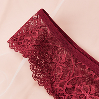 Nouveauté 2026 String sexy en dentelle florale transparente pour femme, ajouré, avec nœud décoratif, respirant, sous-vêtement féminin