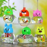 Vente en gros usine : Mini aquarium portable en plastique pour poissons QQ, tortues et méduses, idéal pour présentoir de stand de rue, accessoire d'aquarium