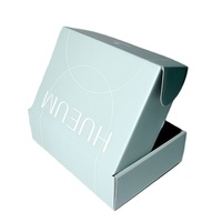 Boîte d'expédition en carton ondulé auto-érectible pour cosmétiques, avec logo personnalisé, faible MOQ, en matériaux recyclés écologiques, finition mate