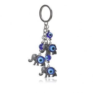 Best Sellers Alloy Turkish Evil Blue Eye 3 Lucky Elephants Pendant Keychain for Users - Product Image 1