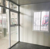 Maison en conteneur à assemblage rapide pour usage en magasin Bureau mobile à mur de verre préfabriqué avec véranda de loisirs Villa de loisirs pratique