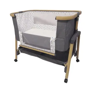 Easy To Use Bedside Baby Co Sleeper Easy Folding Portable Bedside Baby Crib With Storage Basket For Newborn Safe Baby Bassinet