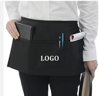 Tablier de serveur court en coton polyester noir à 3 poches et 2 poches pour la cuisine, le café et le bar.