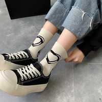 Longues chaussettes mignonnes femmes tricot coton équipage Kawaii belles dames chaussettes de créateur haut Art chaud Sokken Femme
