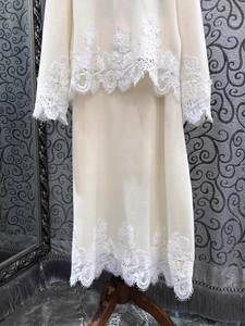 طقم تنورة جديد عالي الجودة لموسم خريف وشتاء 2025 مكون من قطعتين للنساء، سترة صوفية محبوكة من الدانتيل وتنورة طويلة محبوكة - Product Image 6