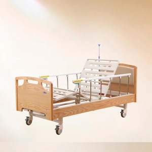 Lit d'hôpital manuel en bois massif avec tête de lit, levage des pieds arrière et réglage en hauteur pour usage en maison de retraite - Product Image 1