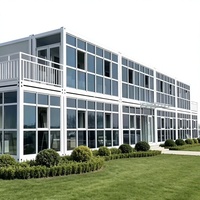 Maison conteneur moderne préfabriquée, démontable et respirante, pour bureau, hôtel, cuisine, école, salon, ou bâtiment modulaire.
