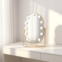 Oval Metal+Glass LED Cosmetic Mirror with 11 Dimmable Light Sources Touch Switch Magnifying Feature Desktop Use