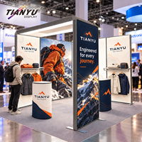 Stand d'exposition modulaire tout-en-un 3x3 6x6 avec caisson lumineux SEG rétroéclairé, tissu tendu, étagères et crochets pour salons professionnels