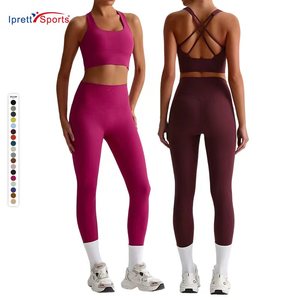 低MOQカスタマイズ女性用ジムワークアウトレギンスヨガパンツクロスバックストラップハイスポーツブラセット女性用フィットネス - Product Image 1