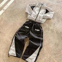 Ensemble de survêtement personnalisé en nylon avec veste, pantalon de jogging et coupe-vent tricoté réfléchissant 3M, imprimé pour la saison automne