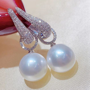 Pendientes de Oreja con Aspecto de Perla de Dos Vías para Mujer, Elegantes y Modernos para Uso Diario - Product Image 1