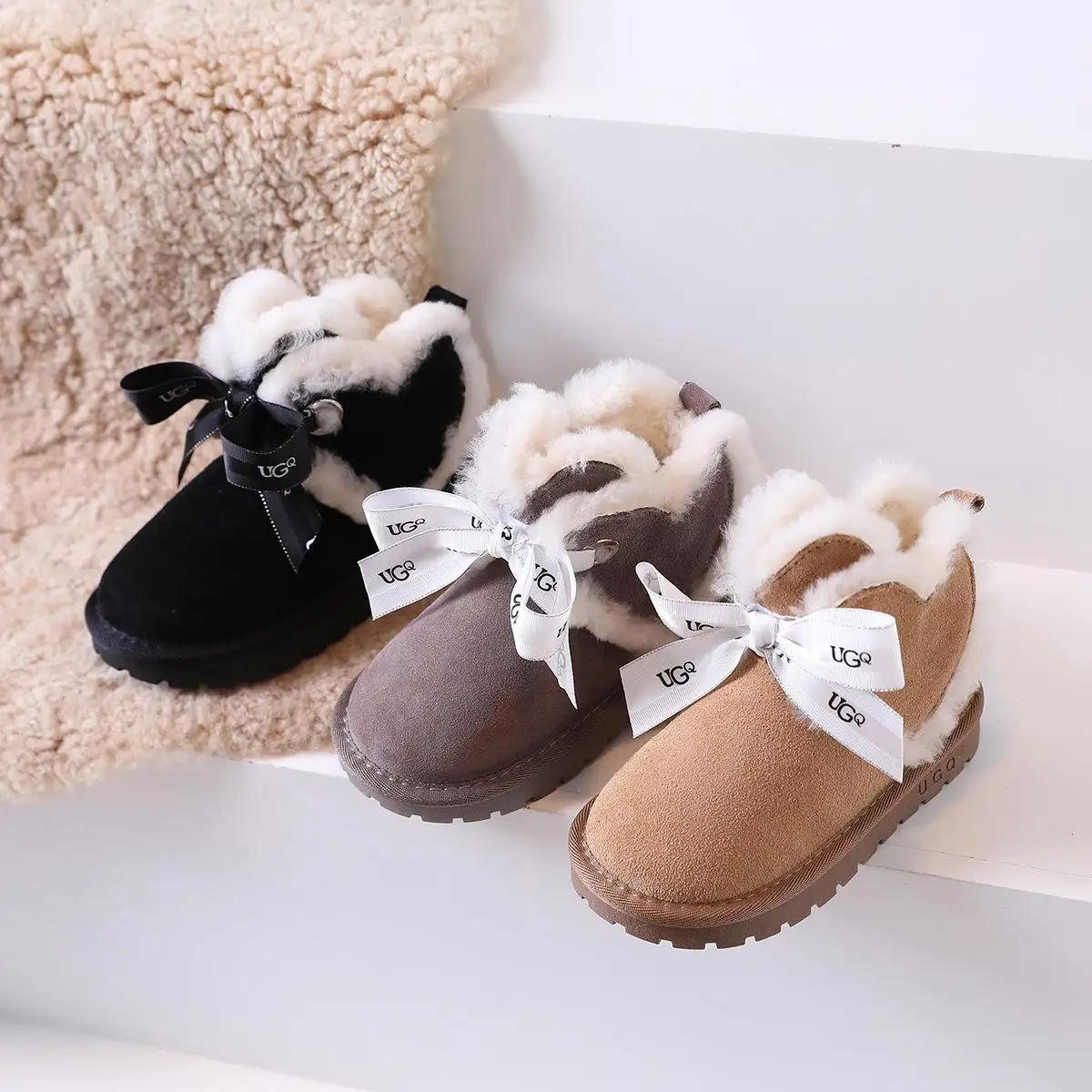 Suola in gomma di pelliccia di moda scarpe invernali per bambini 2022 Design a fiocco piatto con stivali di tendenza per bambini stivali da neve personalizzati per bambini ragazze
