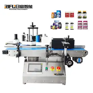 2023 hot sale grape seed alcohol glass round bottle tabletop labeling machine