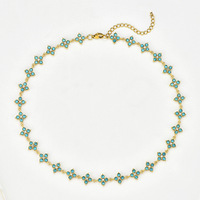 Collier ras-de-cou sportif en acier inoxydable plaqué or 18 carats avec trèfle à quatre feuilles et chaîne en bambou